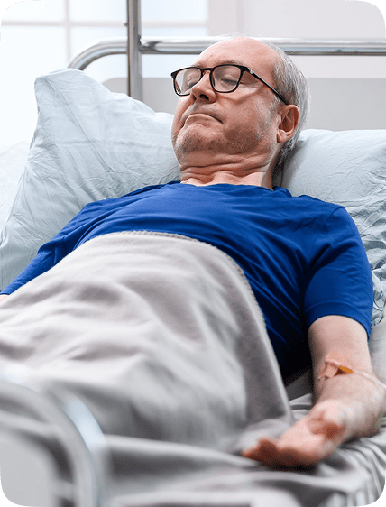 Man in hospital bed